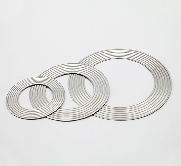 Gasket logam bergelombang